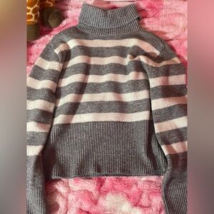Grey and white striped turtle neck sweater